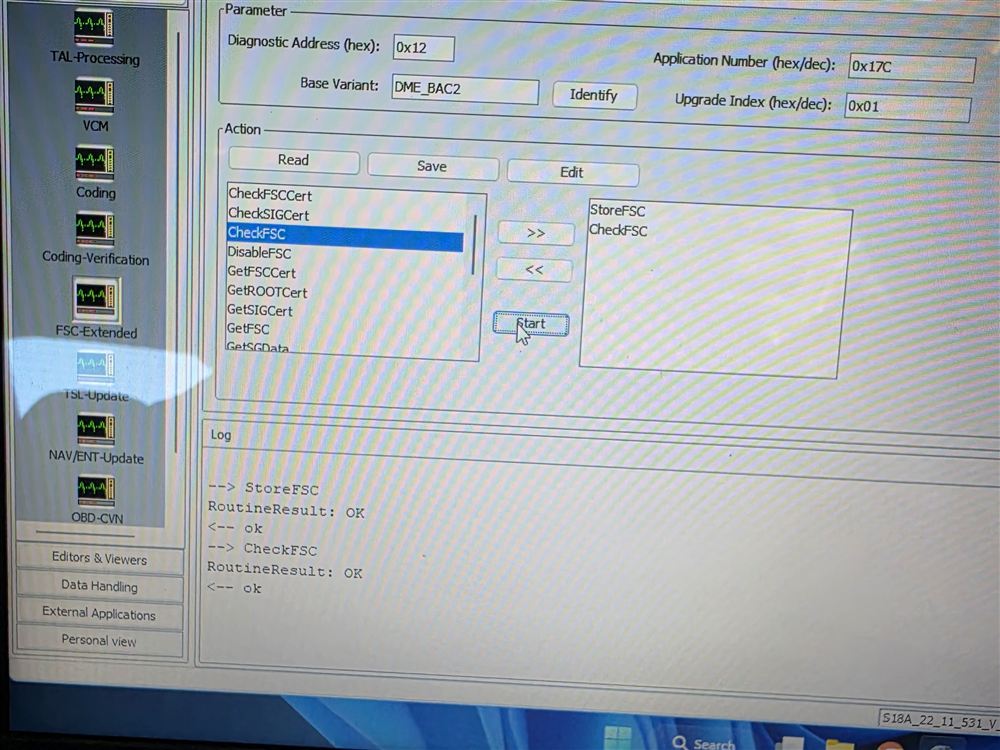 Laptop running BMW coding software, showing the activation certificate stored and checked OK